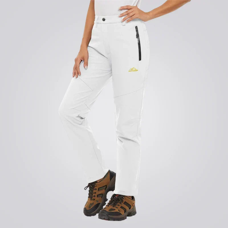 Women's straight-leg snow pants with zip pocket and paneled seams