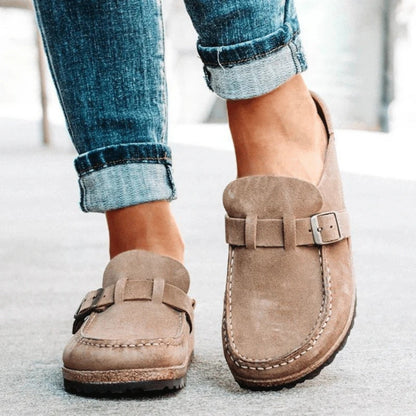 Women's moc toe loafers with buckle straps and flat textured soles