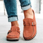 Women's moc toe loafers with buckle straps and flat textured soles