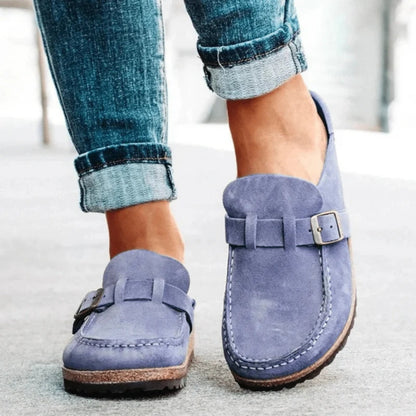 Women's moc toe loafers with buckle straps and flat textured soles