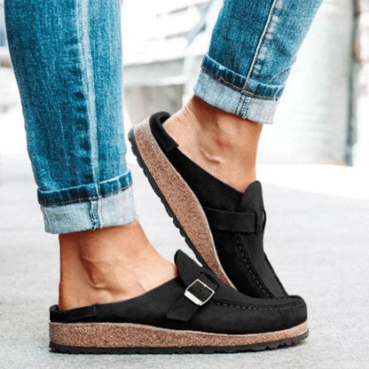 Women's moc toe loafers with buckle straps and flat textured soles