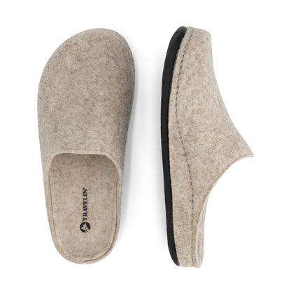 Beige open-back slip-on house slippers with rounded toes and black flat soles