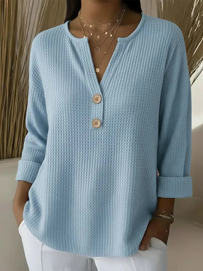 Women's textured waffle henley top with split neckline, buttons and long sleeves