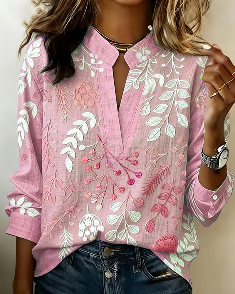 Women's botanical print blouse with notched collar and 3/4 sleeves