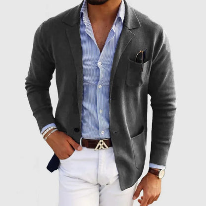 Men's solid blazer with notched lapels, long sleeves, buttons and front pockets