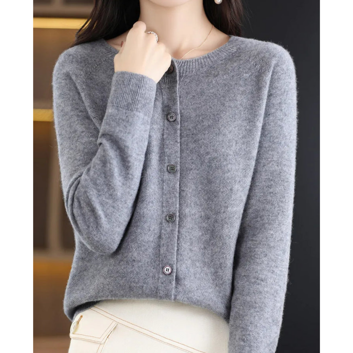Women's plain button-front cardigan sweater with long sleeves and ribbed trims