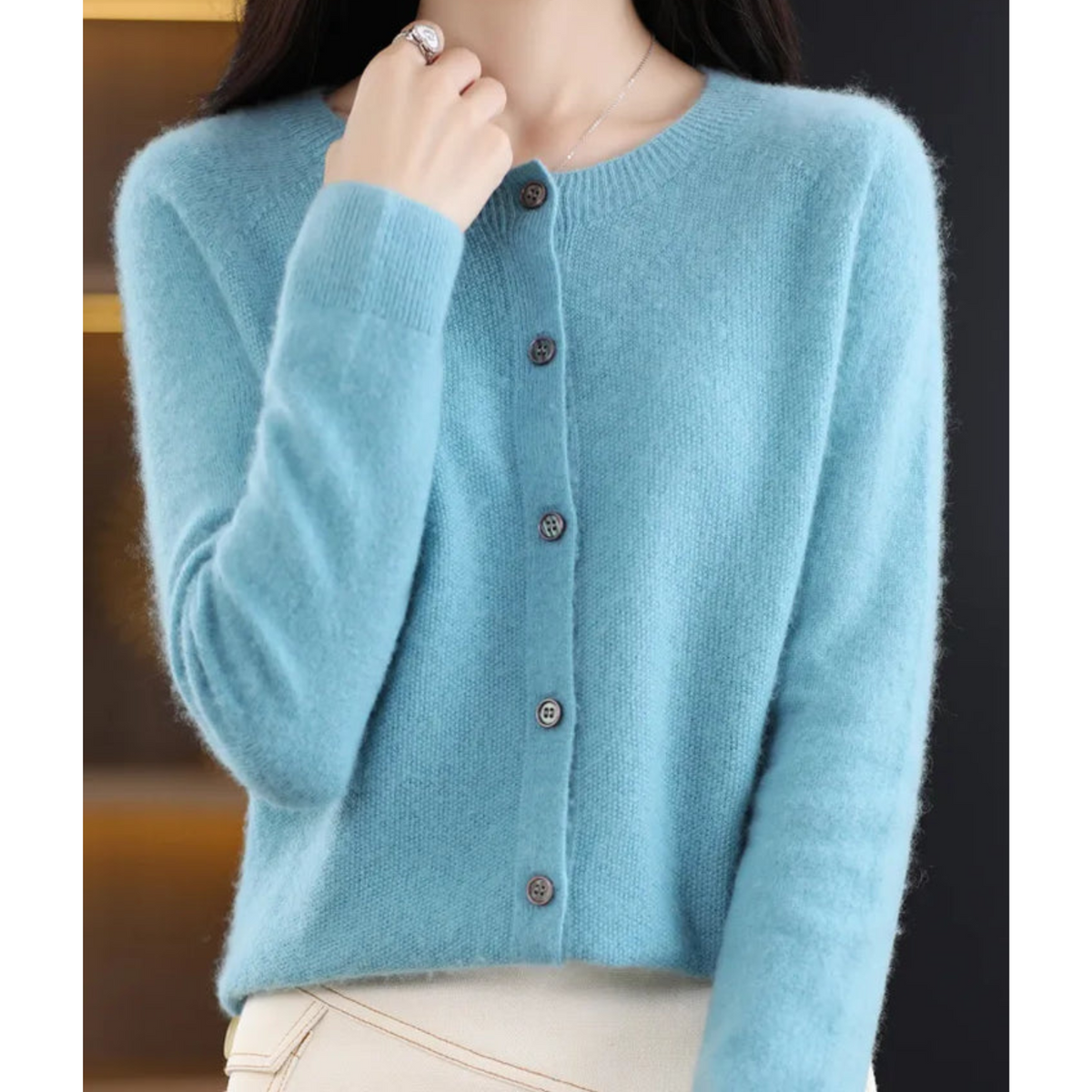 Women's plain button-front cardigan sweater with long sleeves and ribbed trims