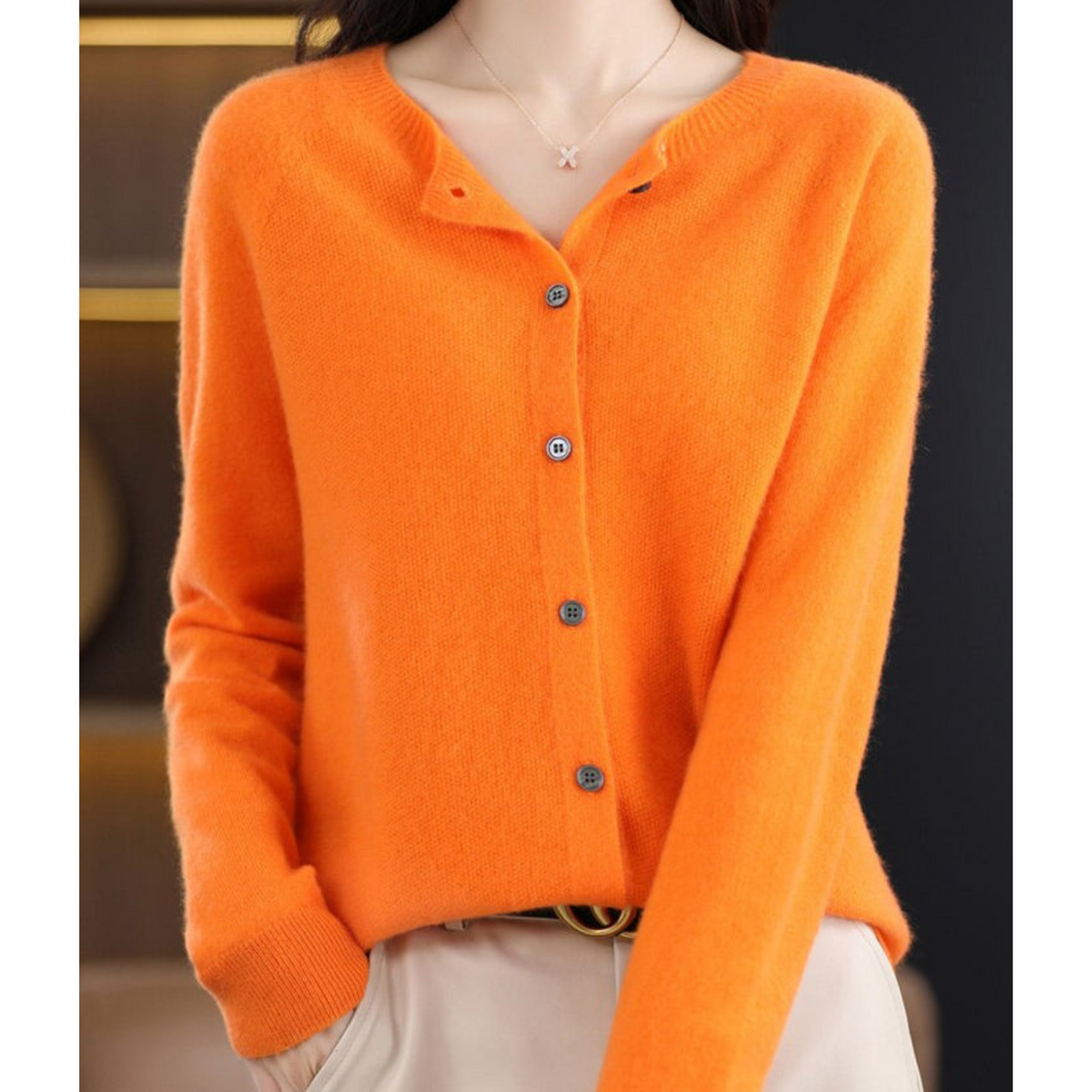 Women's plain button-front cardigan sweater with long sleeves and ribbed trims
