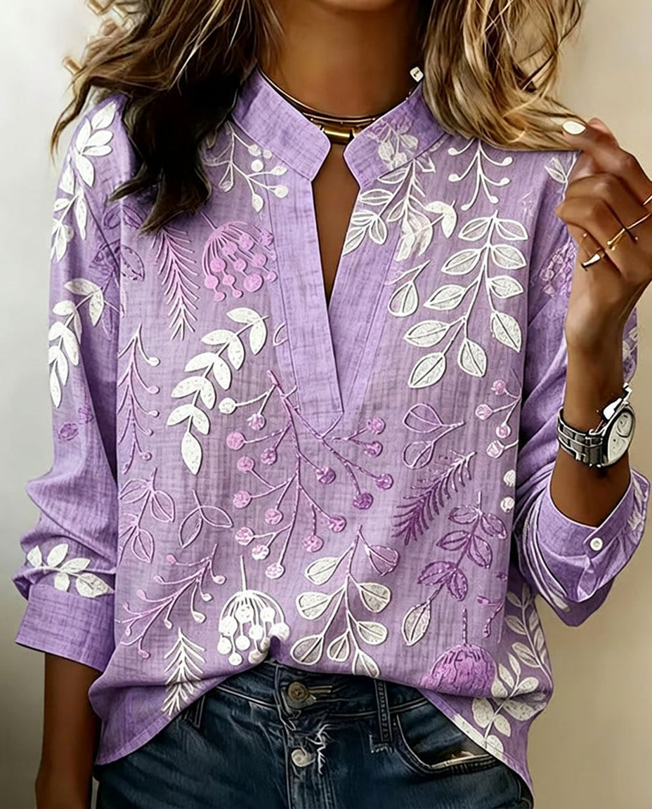 Women's botanical print blouse with notched collar and 3/4 sleeves