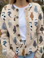 Beige knit cardigan with an all-over cat print and button front