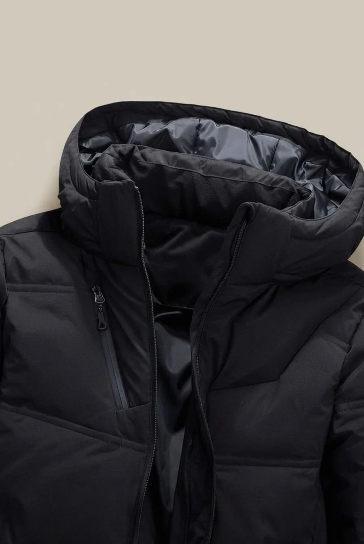 Men's hooded padded jacket with quilted panels and zip pockets