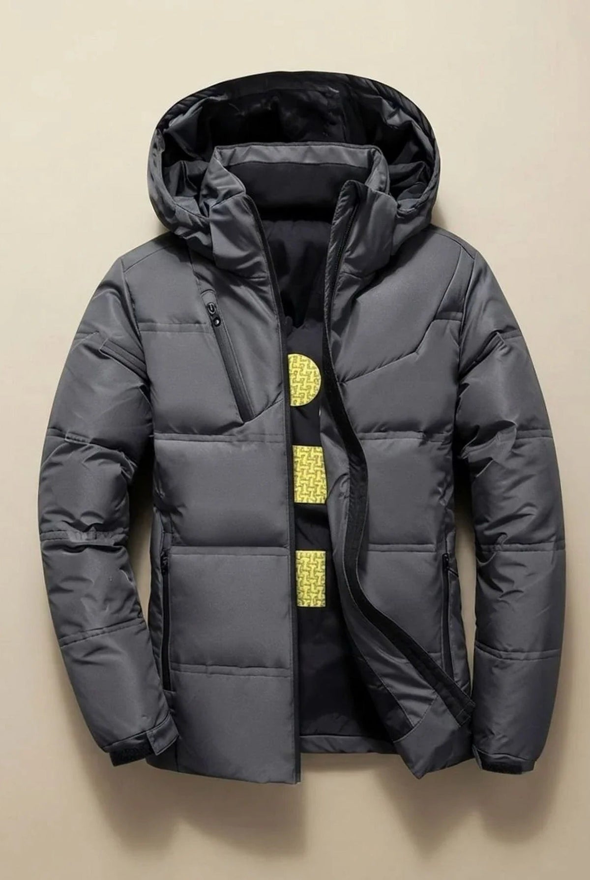 Men's hooded padded jacket with quilted panels and zip pockets