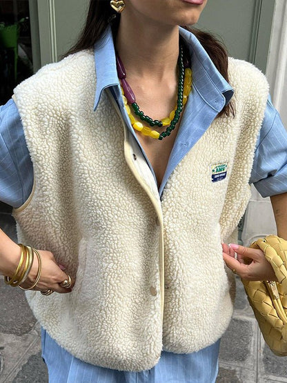 Women's sleeveless textured button-front vest with V-neck