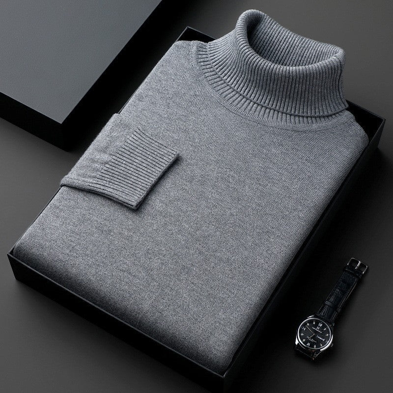 Folded solid turtleneck sweater with ribbed collar and long sleeves
