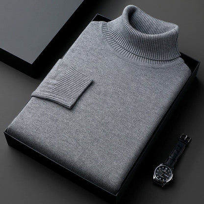 Folded solid turtleneck sweater with ribbed collar and long sleeves