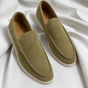 Men's slip-on loafers with round toes, stitched edging and contrast flat soles