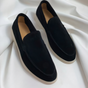 Men's slip-on loafers with round toes, stitched edging and contrast flat soles