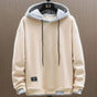 Men's two-tone color-block pullover hoodie with drawstring hood and long sleeves