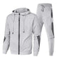 Men's two-piece tracksuit with zip hoodie and joggers, side stripe detail