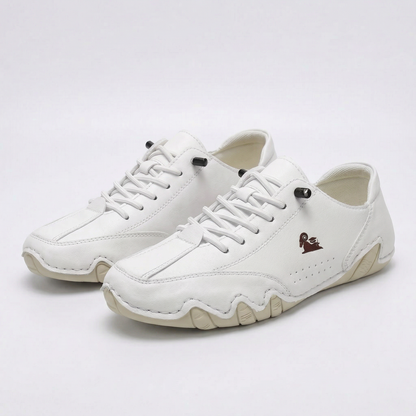 Low-top lace-up sneakers with round toes, stitched panels and segmented soles