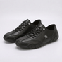 Low-top lace-up sneakers with round toes, stitched panels and segmented soles
