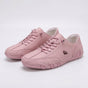 Low-top lace-up sneakers with round toes, stitched panels and segmented soles
