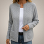 Women's ribbed knit cardigan with long sleeves and front patch pockets