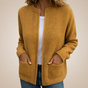 Women's ribbed knit cardigan with long sleeves and front patch pockets