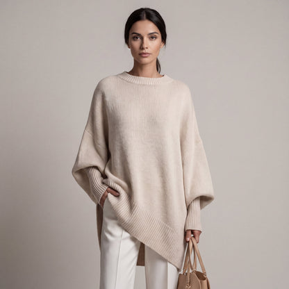 Women's oversized knit sweater with crew neck and asymmetric longline hem