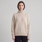 Women's long-sleeve ribbed turtleneck sweater with relaxed fit