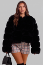 Women's boxy faux fur jacket with horizontal panels and long sleeves