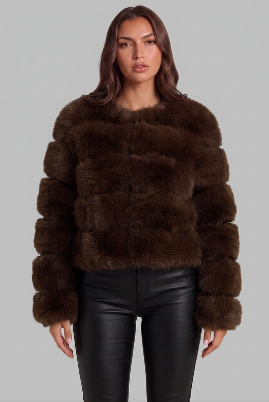 Women's boxy faux fur jacket with horizontal panels and long sleeves
