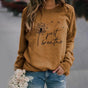 Women's long-sleeve sweatshirt with dandelion Just Breathe graphic