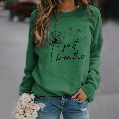 Women's long-sleeve sweatshirt with dandelion Just Breathe graphic