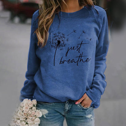 Women's long-sleeve sweatshirt with dandelion Just Breathe graphic