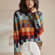 Women's multicolor checkered turtleneck sweater with long sleeves