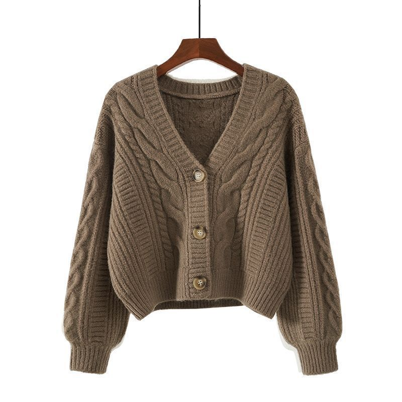 Women's cropped cable knit cardigan with V-neck and button front