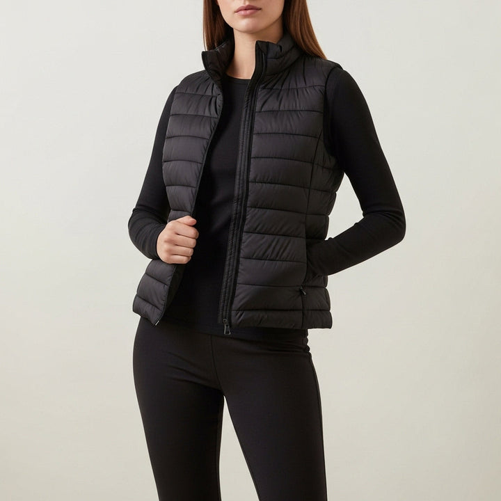 Women's sleeveless quilted vest with stand collar and front zip fastening