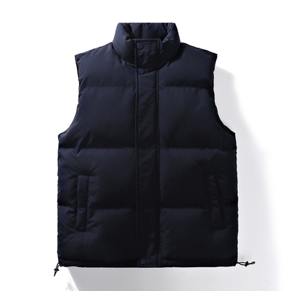 Men's navy quilted sleeveless puffer vest with mock neck and snap front
