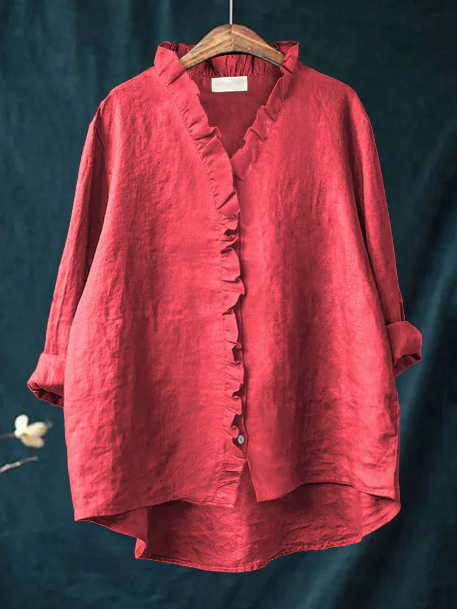 Long-sleeve ruffled V-neck blouse with button front and curved hem