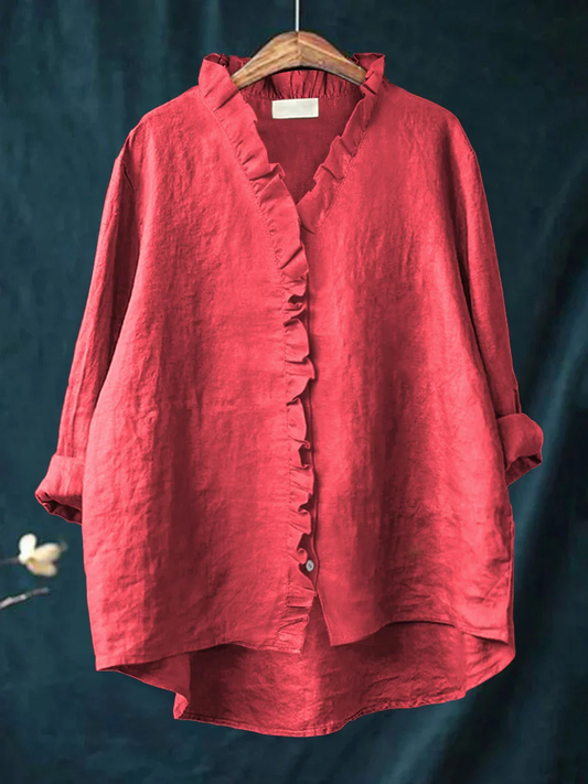 Long-sleeve ruffled V-neck blouse with button front and curved hem
