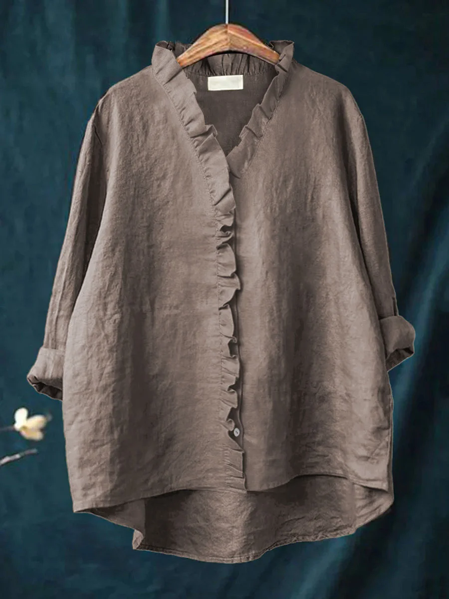 Long-sleeve ruffled V-neck blouse with button front and curved hem