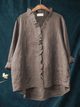 Long-sleeve ruffled V-neck blouse with button front and curved hem
