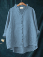 Long-sleeve ruffled V-neck blouse with button front and curved hem