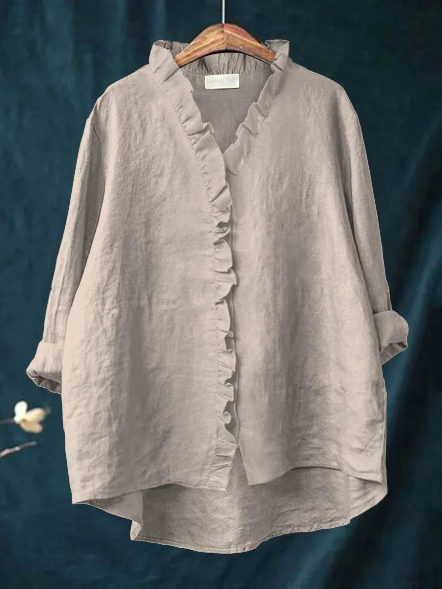Long-sleeve ruffled V-neck blouse with button front and curved hem