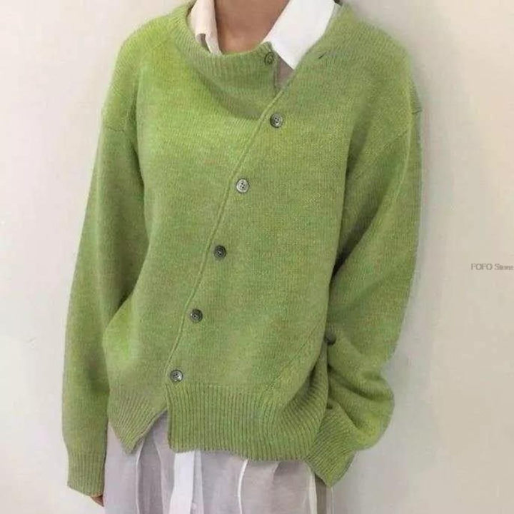 Women's button front cardigan sweater with long sleeves and ribbed trims