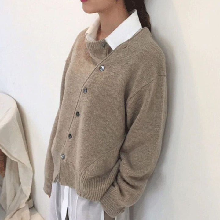 Women's button front cardigan sweater with long sleeves and ribbed trims