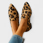 Tan and black leopard print pointed-toe loafers with metal horsebit detailing