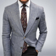 Men's textured tailored blazer with notched lapels and button front