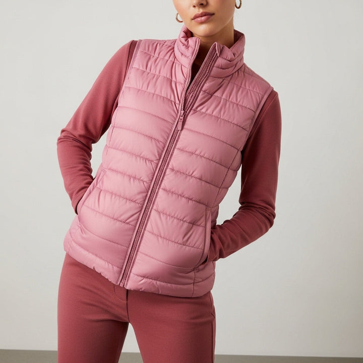 Women's sleeveless quilted vest with stand collar and front zip fastening